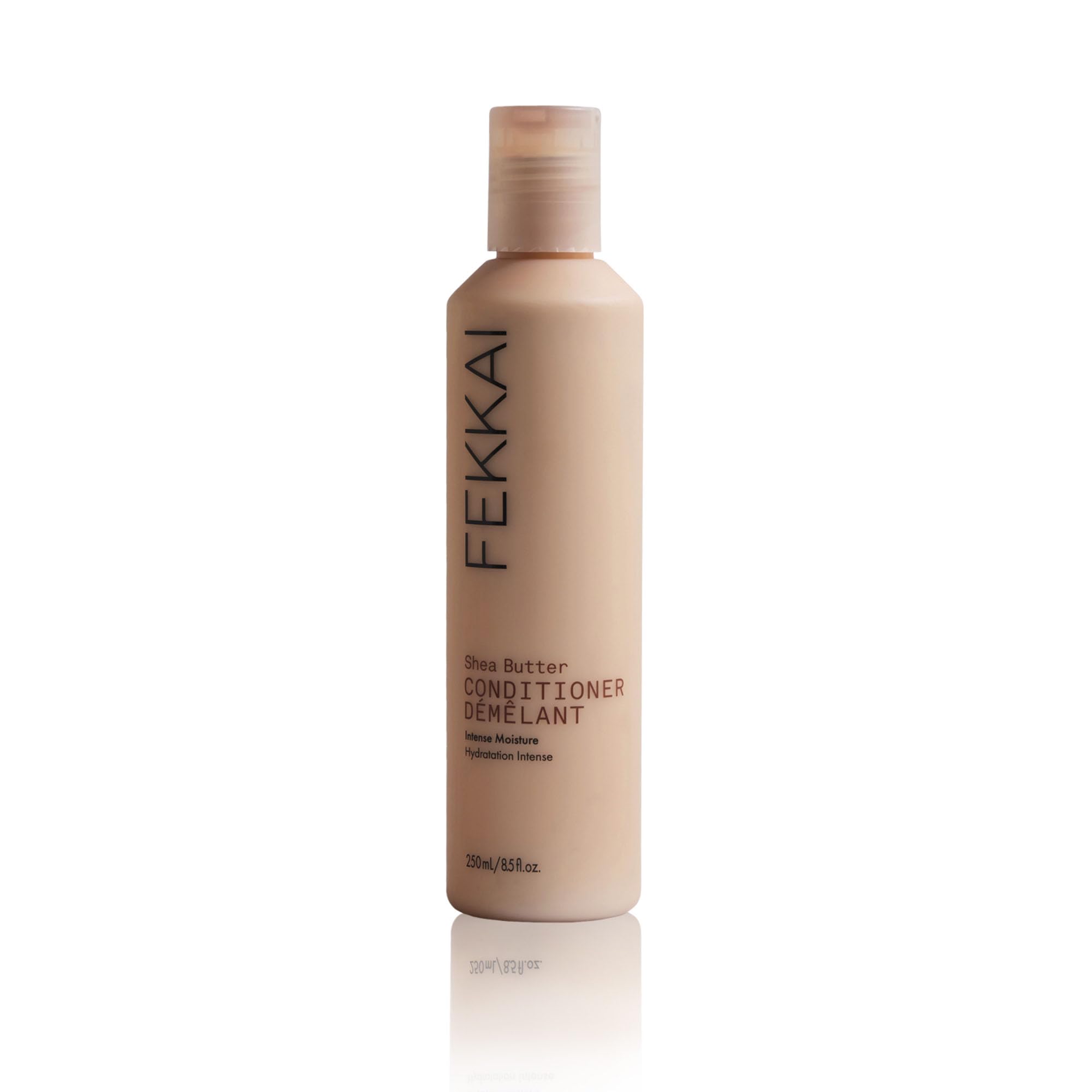 Fekkai Shea Butter Conditioner bottle demonstrates rich hydration for glossy, frizz-controlled hair