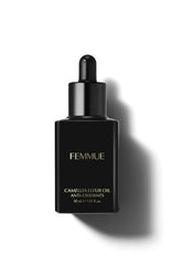 FEMMUE Camellia Elixir bottle pours for a hydrating skincare moment.