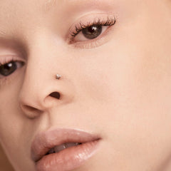 Fenty Bright Fix applicator near the eye for precise blending