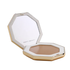 Fenty Beauty Cheeks Out Freestyle Cream Bronzer 04 Hunnie Glaze swatch on skin for natural warmth