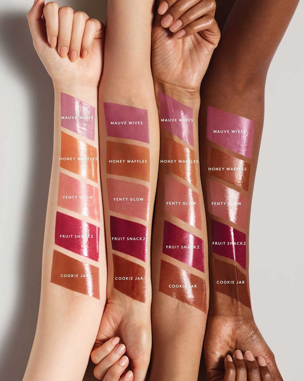 Fenty Beauty Gloss Bomb Color Drip Lip Cream glaze on lips with moisturizing shine.