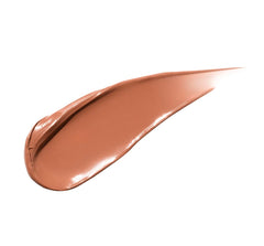 FENTY BEAUTY Gloss Bomb Cream Color Drip Honey Waffles on lips shows smooth texture.