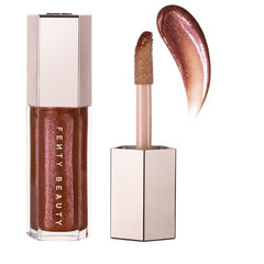 FENTY BEAUTY Gloss Bomb Heat universal lip luminizer delivers glossy shine and subtle plump.