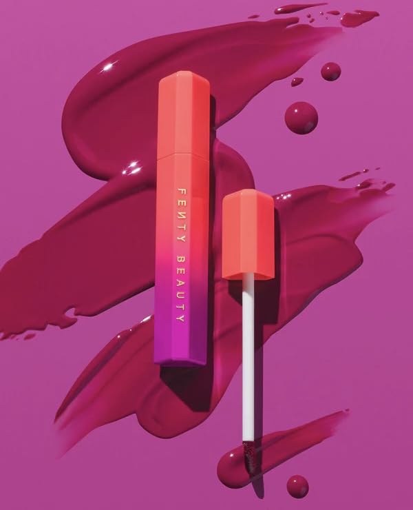 Fenty Beauty Poutsicle on lips shows vibrant glow with a soft tint.
