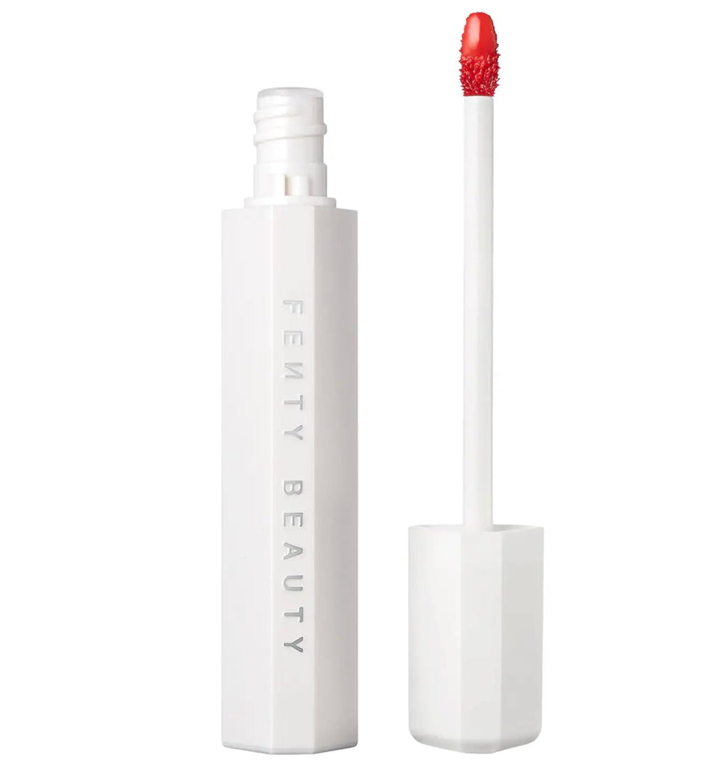 Fenty Beauty Poutsicle Zesty Bestie front view with coral tint and hydrating gloss