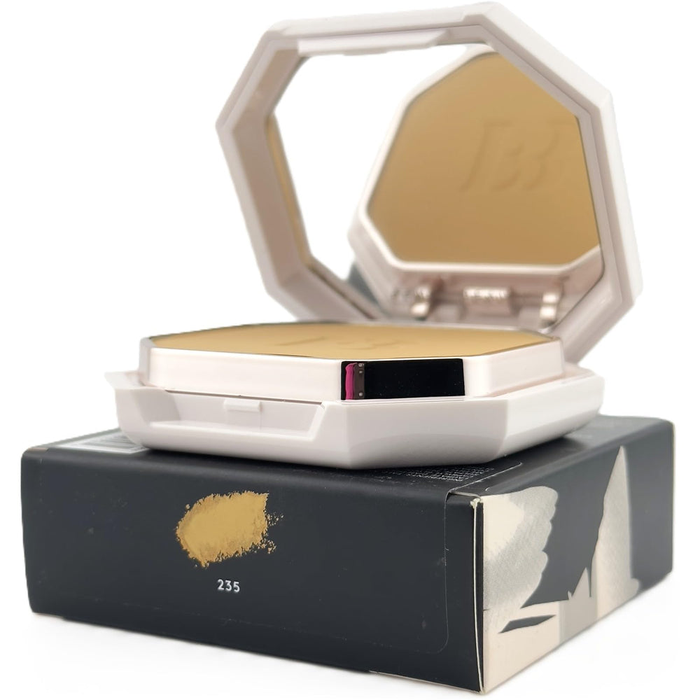 Soft-matte powder texture shown during gentle application on the cheek