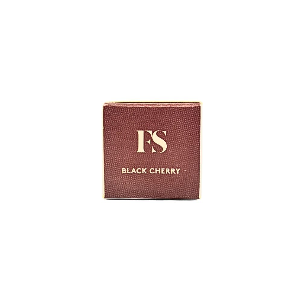 Packaging box of Fenty Treatz lip oil highlighting vegan, cruelty-free notes