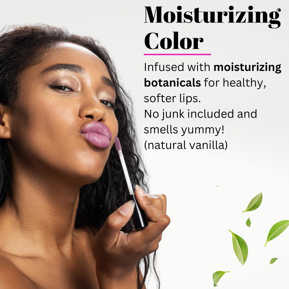 Fifth & Skin Botanical Lip Gloss Plum being applied for buildable purple-pink shine