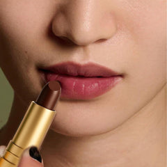 Finding Ferdinand lip balm close-up shows sheer tint for natural everyday wear.