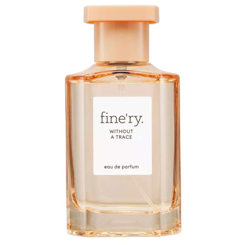 Fine'ry Without a Trace bottle close-up highlighting neroli and cedarwood notes for a refined scent.