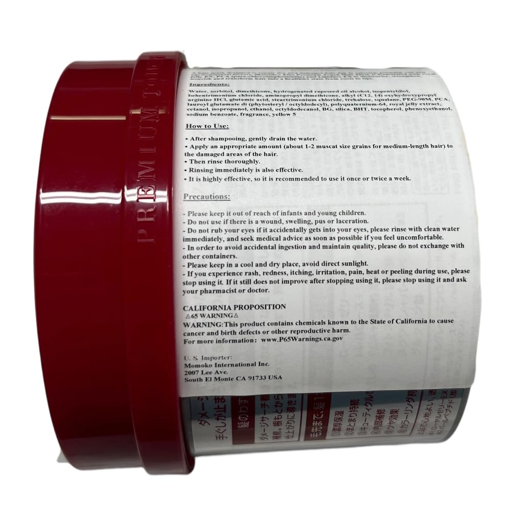 Fino EMBEAUTY Premium Touch Hair Mask applying evenly through hair mid-lengths.
