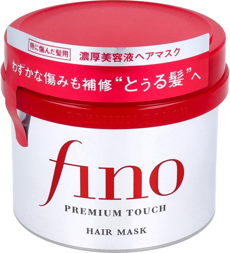 Fino EMBEAUTY Premium Touch Hair Mask tube closeup with rich nourishing formula.