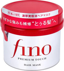 Fino EMBEAUTY Premium Touch Hair Mask tube closeup with rich nourishing formula.