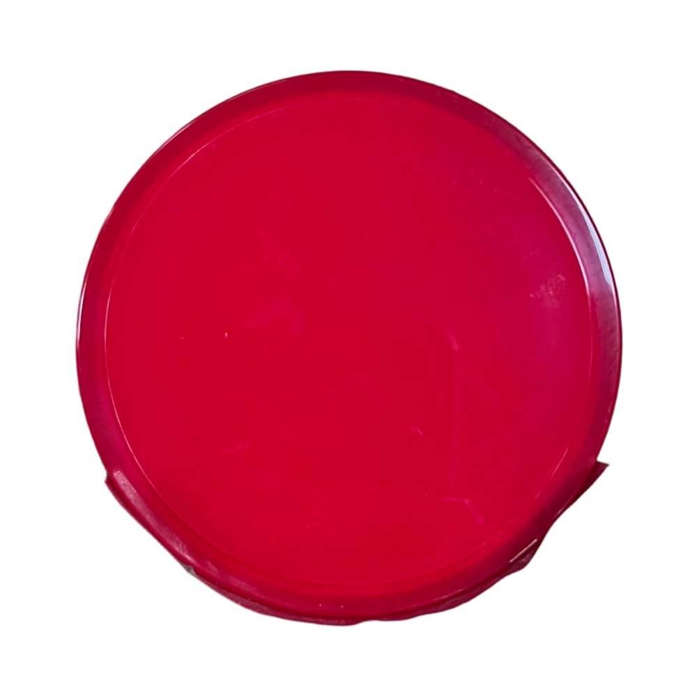 Fino EMBEAUTY Premium Touch Hair Mask jar on vanity with soft lighting.