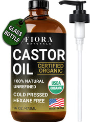 Fiora Naturals organic castor oil in a 16oz dark glass bottle with pump for hair nourishment