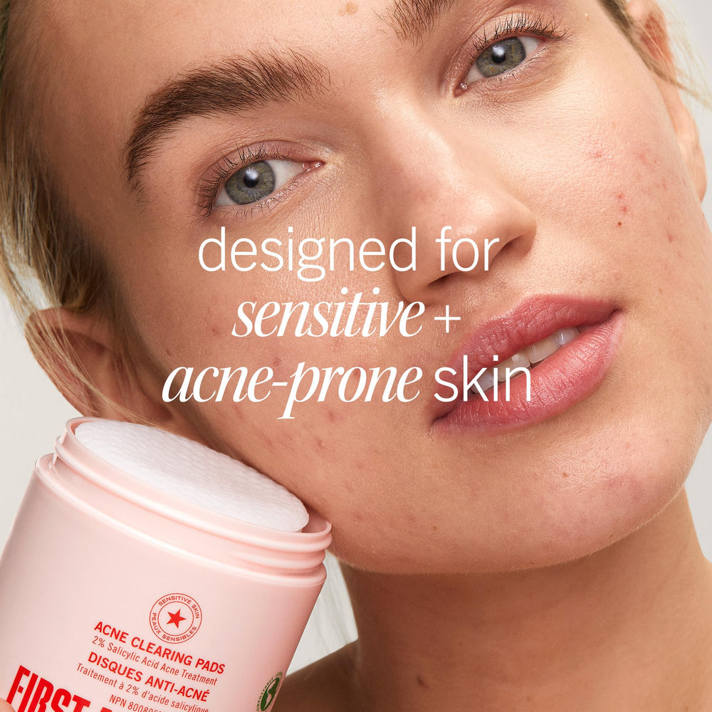 First Aid Beauty Acne Pads soft texture close-up on skin.