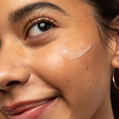 First Aid Beauty Coconut Water Cream texture close-up reveals lightweight absorption.