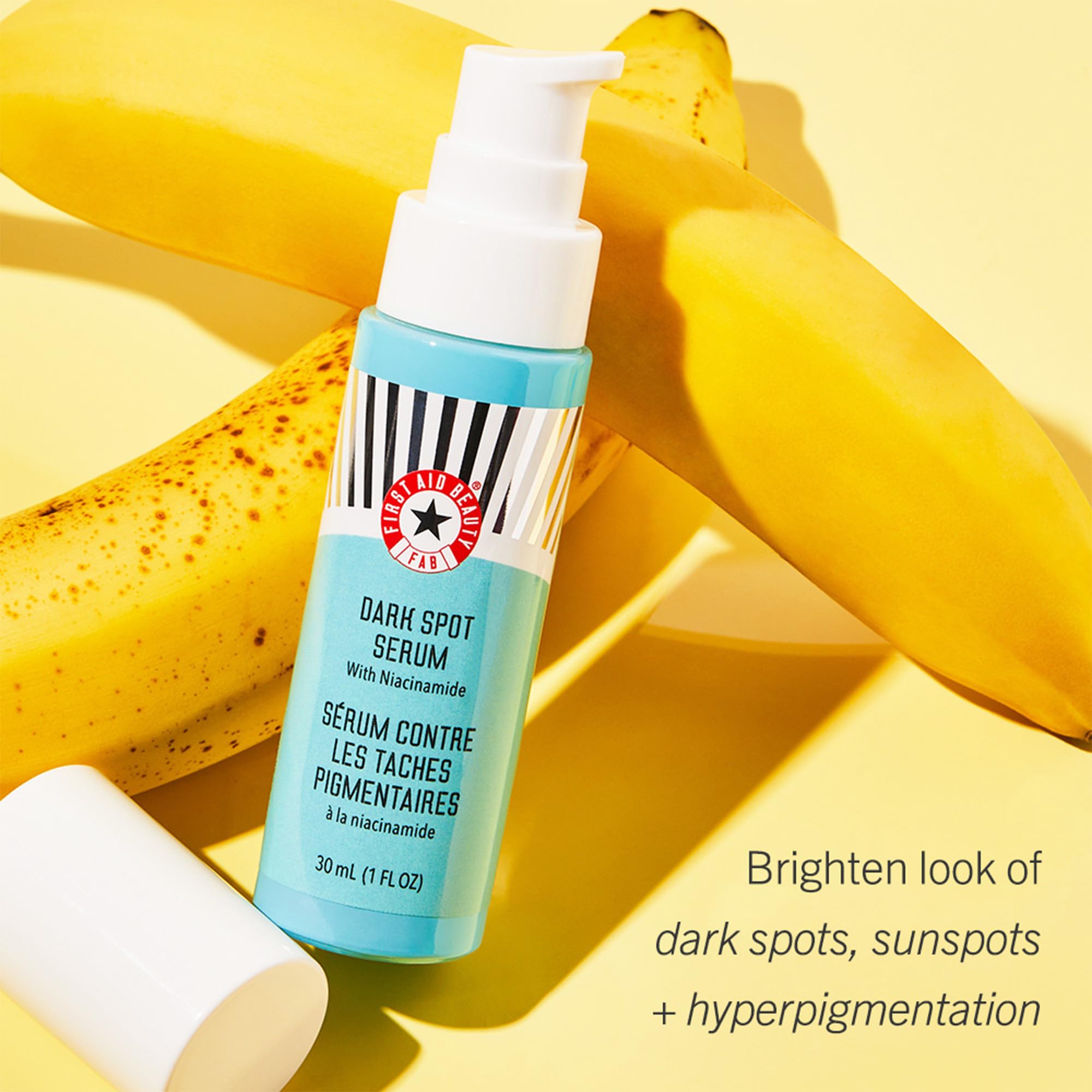 First Aid Beauty niacinamide serum dispensing pump close-up for easy application.