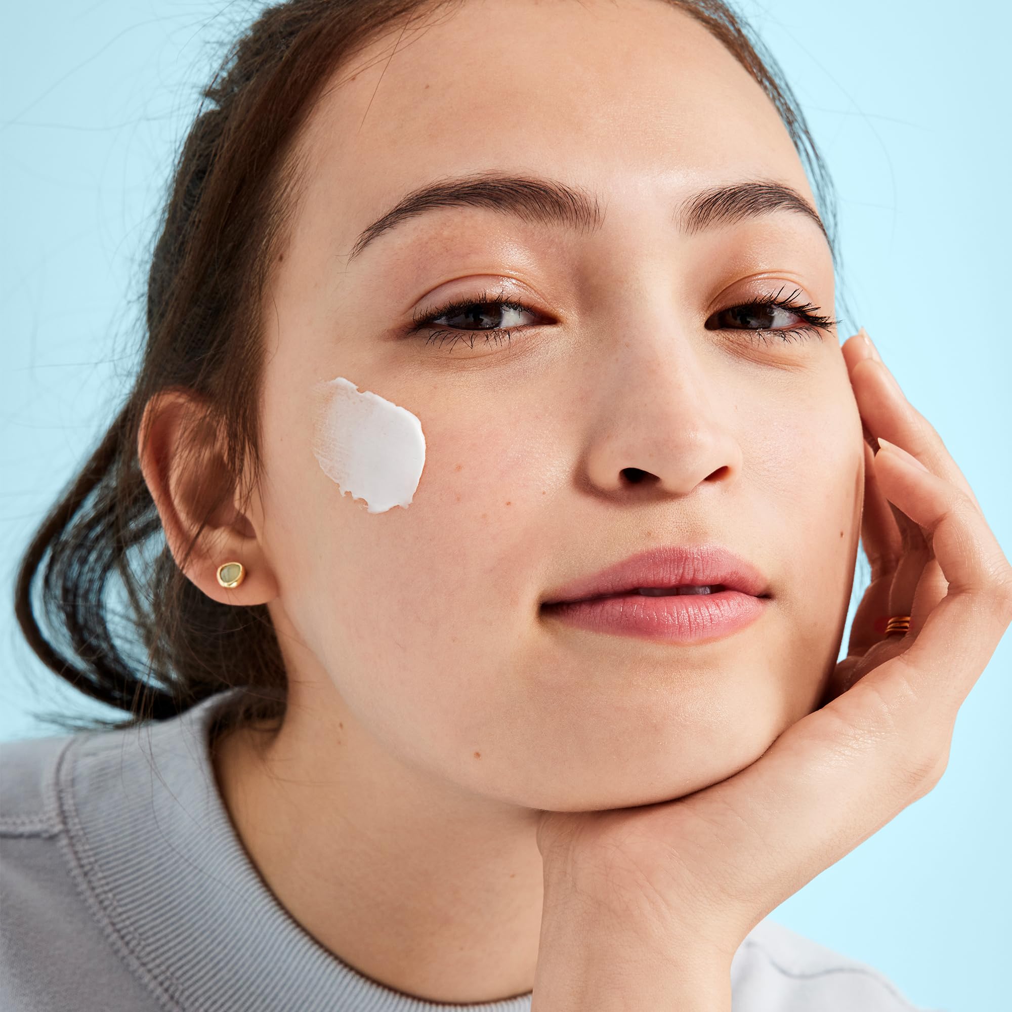 First Aid Beauty peptides and niacinamide illustration emphasizes anti-aging support.