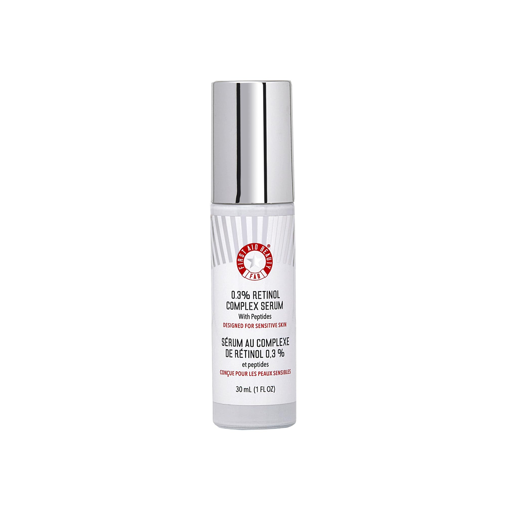 First Aid Beauty Retinol Complex Serum bottle on bathroom counter, gentle for sensitive skin.