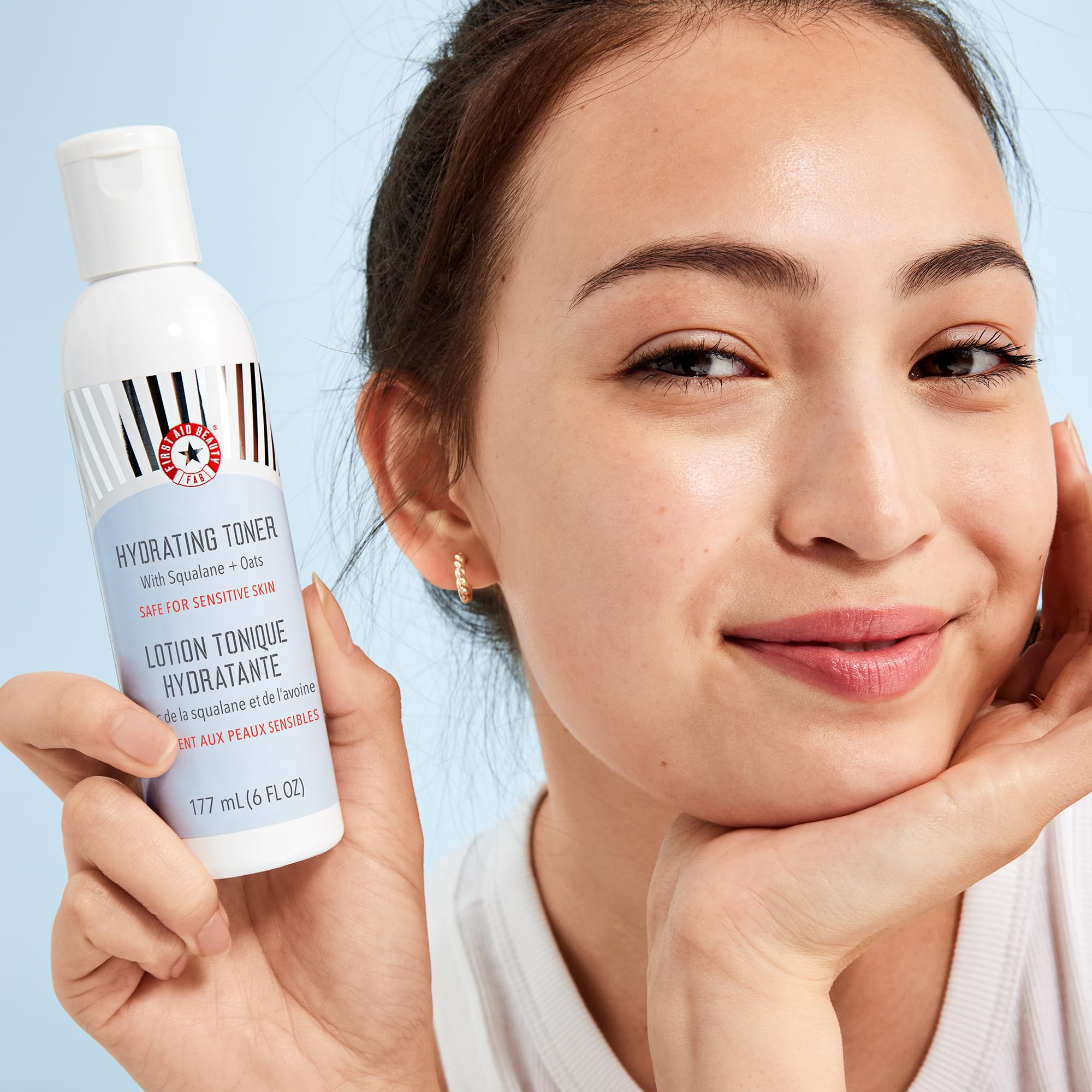 First Aid Beauty toner pump dispense image emphasizes easy, even application.