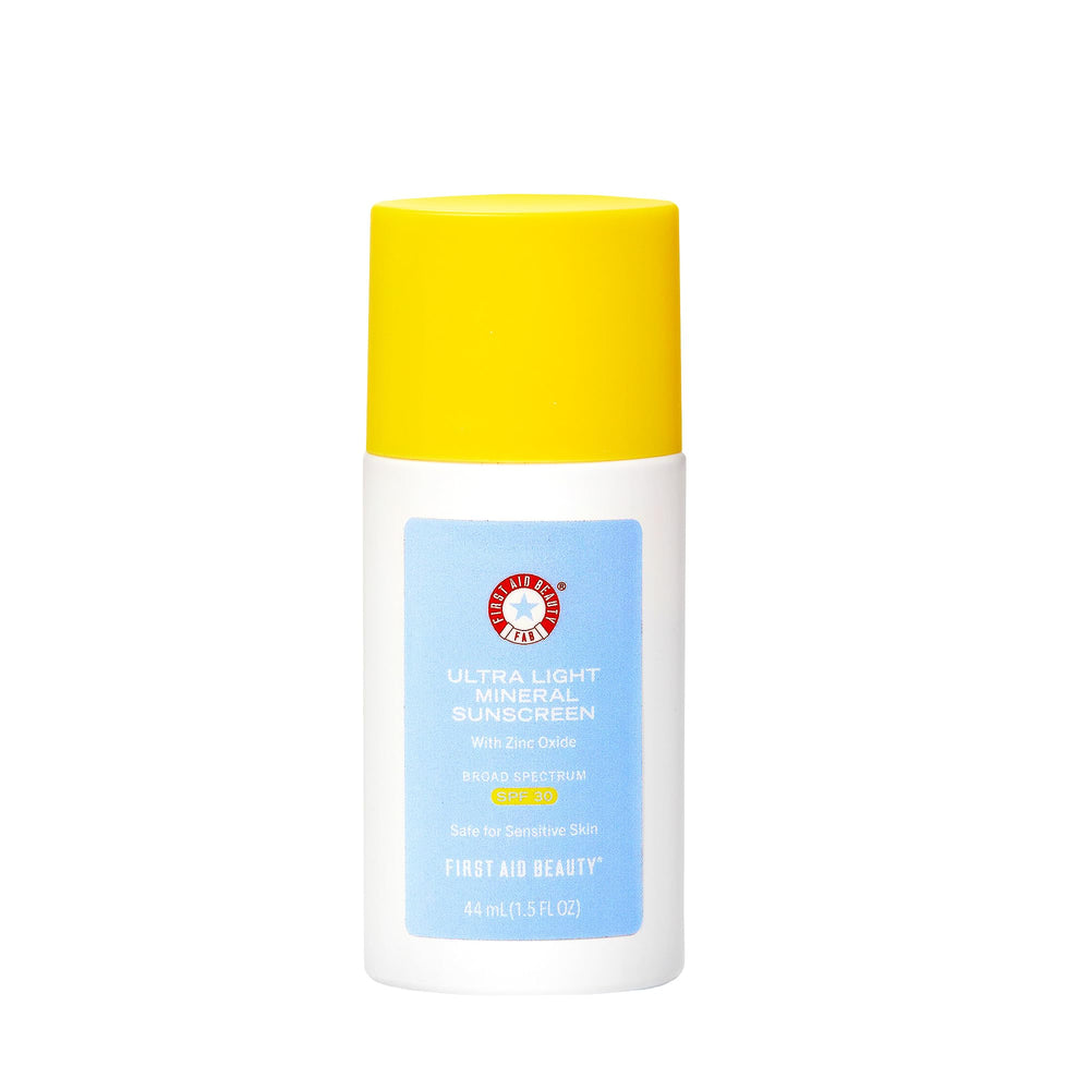 First Aid Beauty weightless sunscreen bottle shows a breathable, non-greasy feel for daily wear.