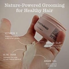 Firsthand Hair Clay Pomade in hand demonstrates scoopable texture for easy application.