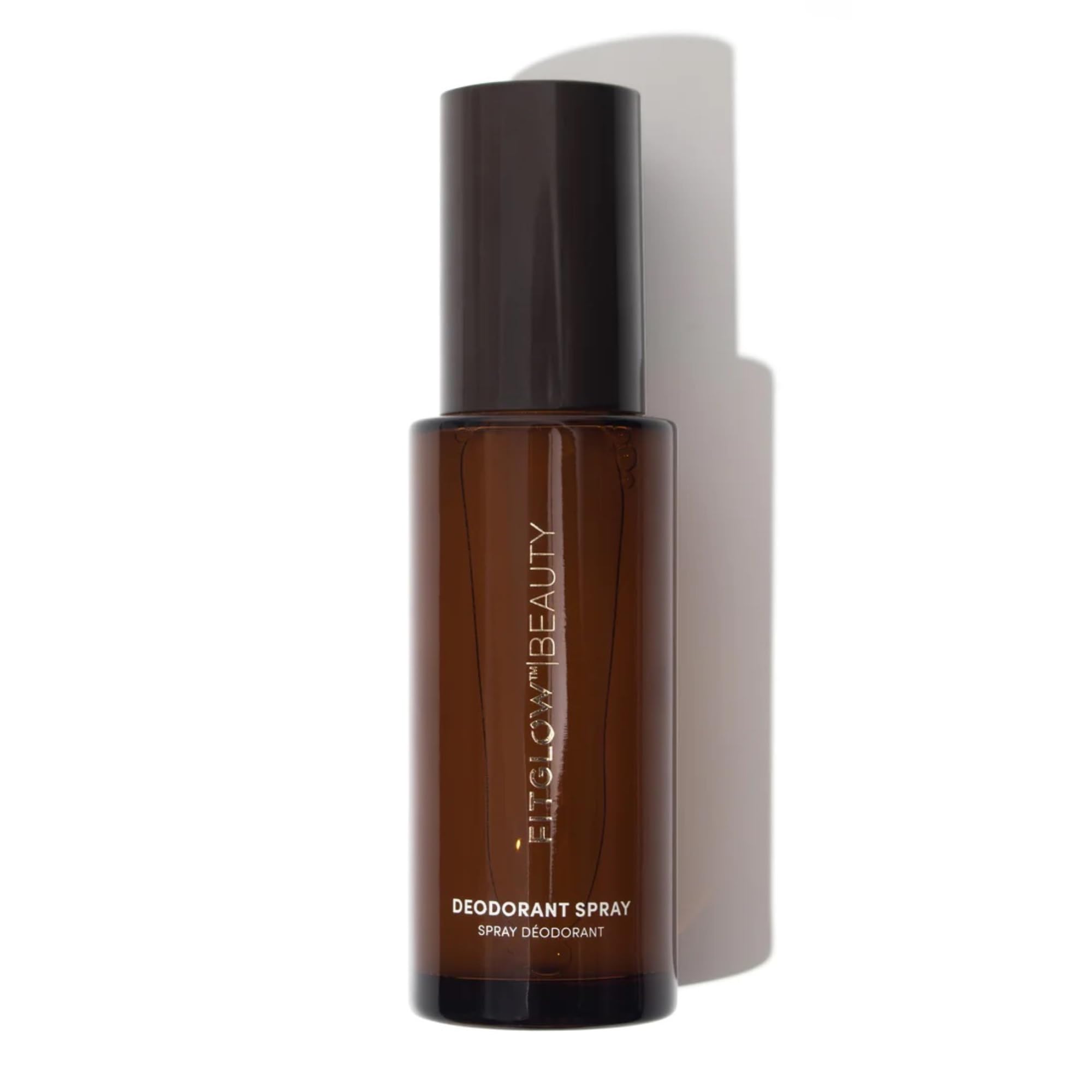 FITGLOW Beauty Deodorant Spray bottle close-up showing aluminum-free formula for sensitive skin.