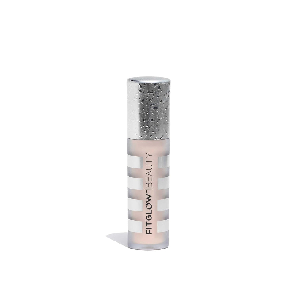 Fitglow Conceal+ compact jar for full-coverage touch-ups on the go.