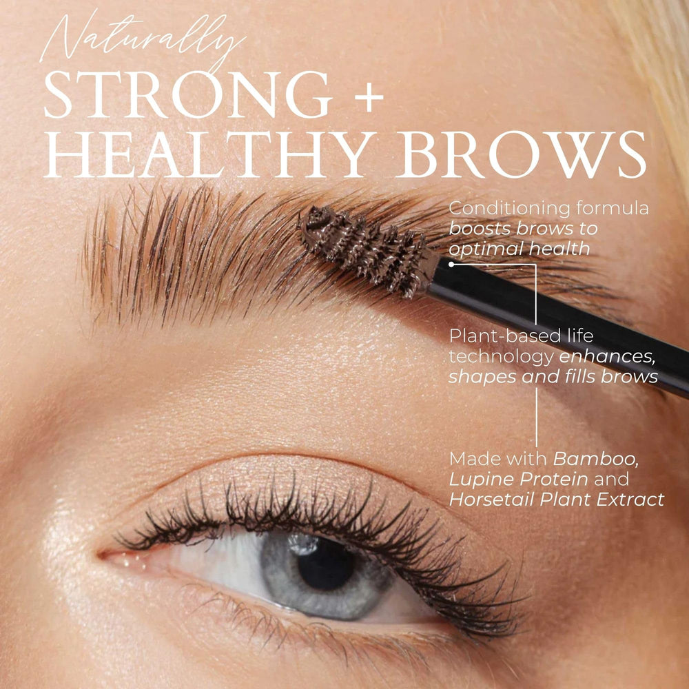 Close-up of applying Fitglow Brow Gel with precise brow brush.