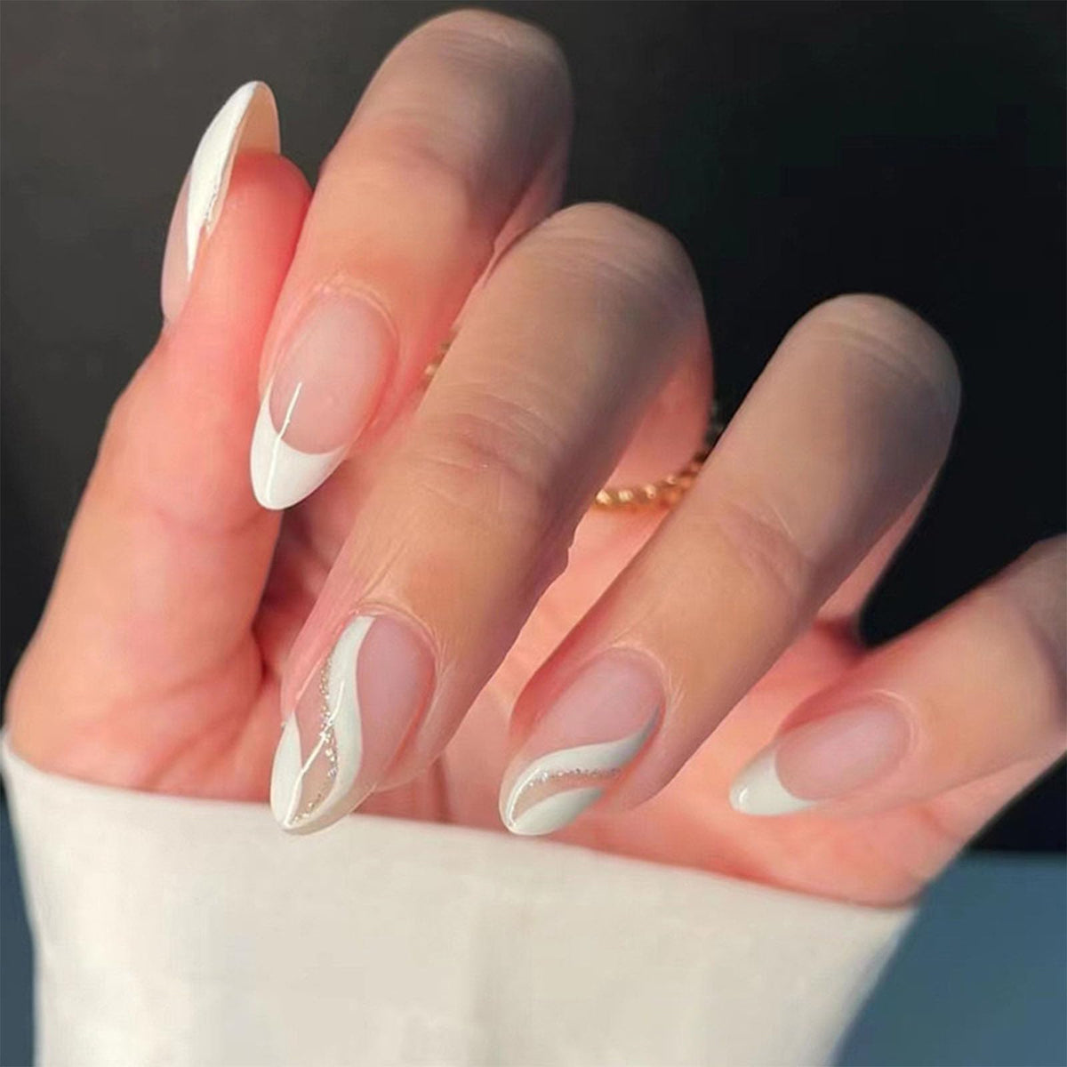 FJSMTOPL French tip almond nails with glossy white swirl for at home manicure