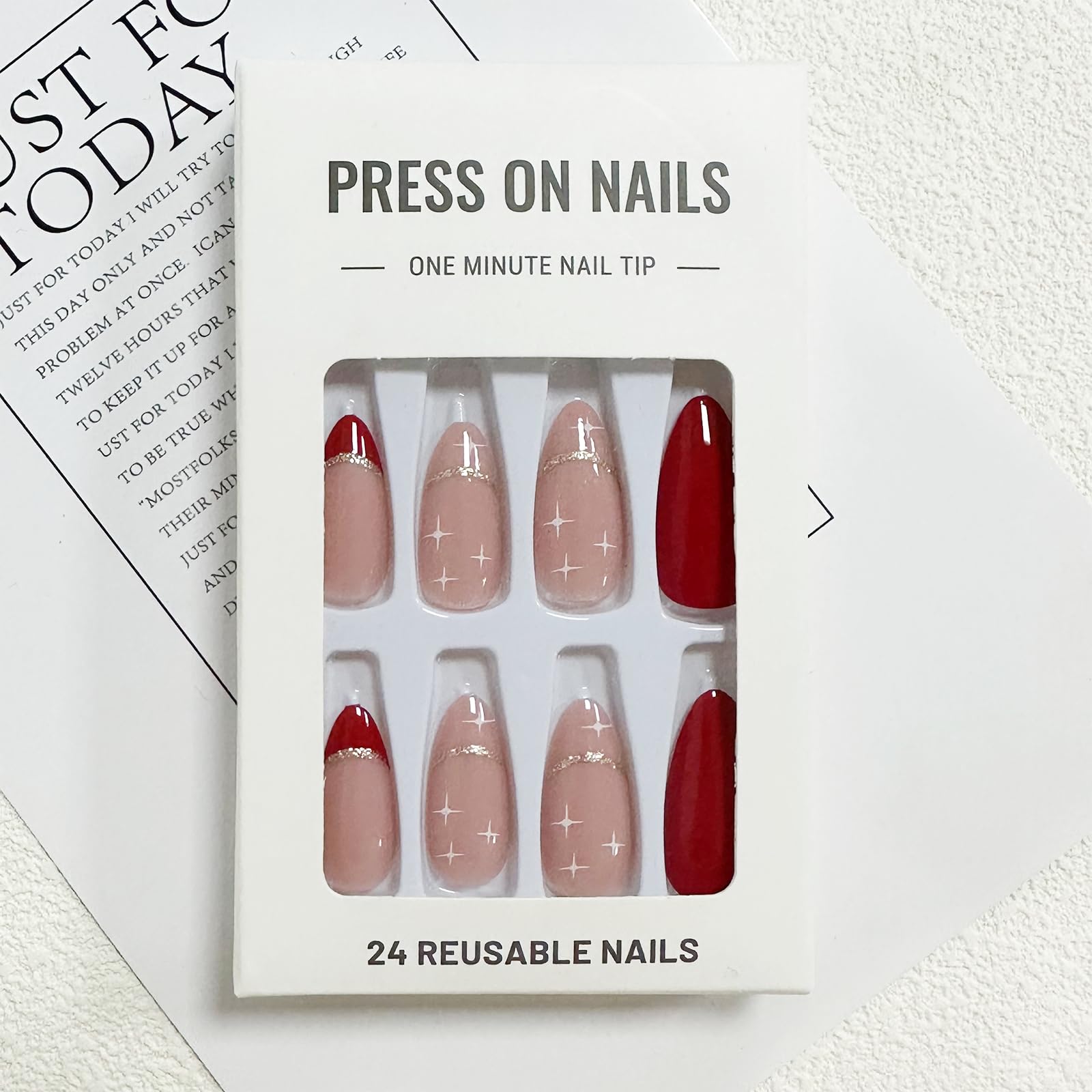 FJSMTOPl glossy French-tip press-ons offering a classy night-out look.