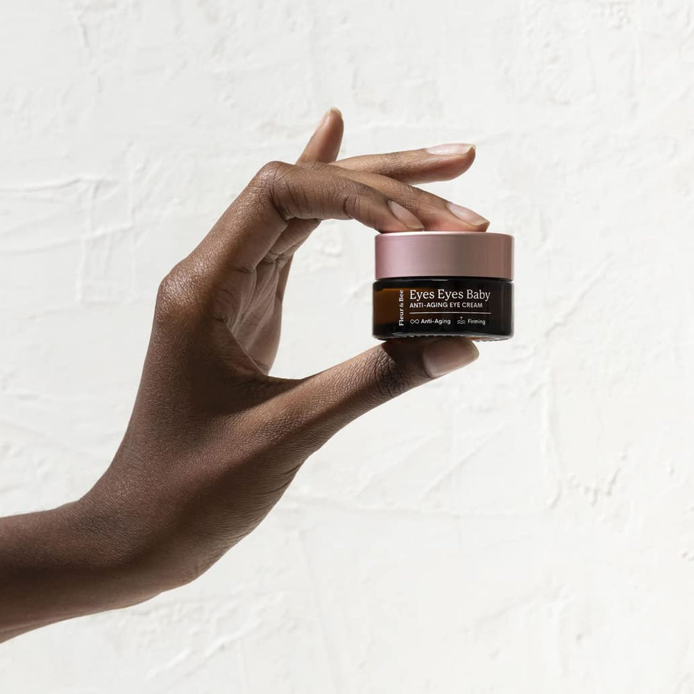 Creamy texture swirl of Fleur & Bee eye cream for hydration.