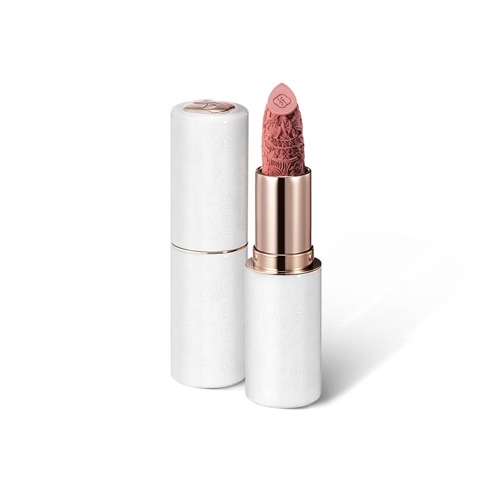 FLORASIS Blooming Rouge lipstick swatch reveals creamy feather-light texture for smooth application.