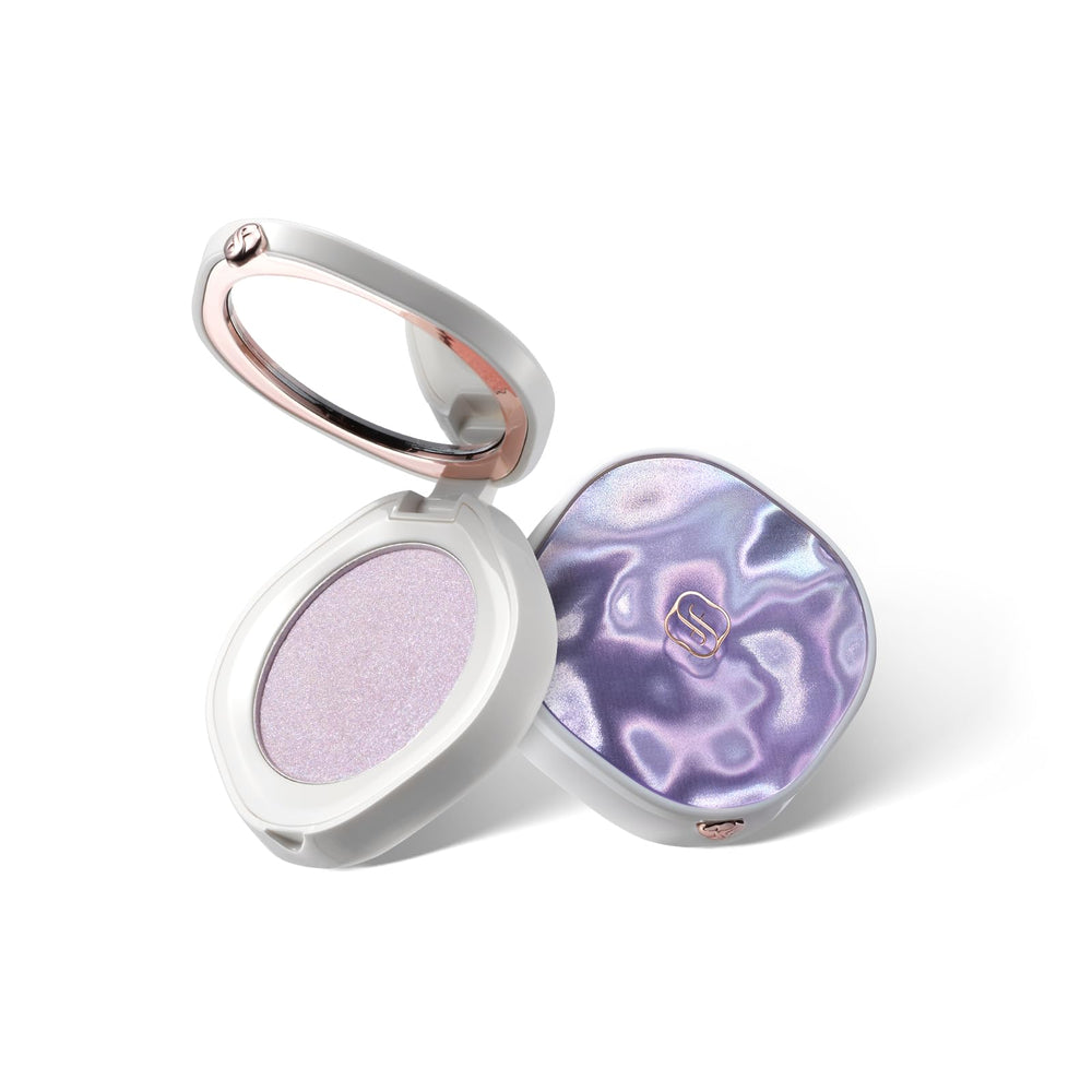 FLORASIS Gentle Waves Aqua Glow Highlighter 03 Lilac Haze packaging showcases a luxurious shimmer for day-to-night wear.
