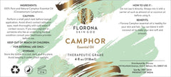 Florona Camphor Oil used in hair care for potential scalp refreshment and shine.