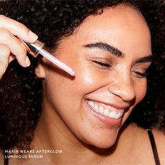 Serum swirl on skin suggests soft blur and natural radiance