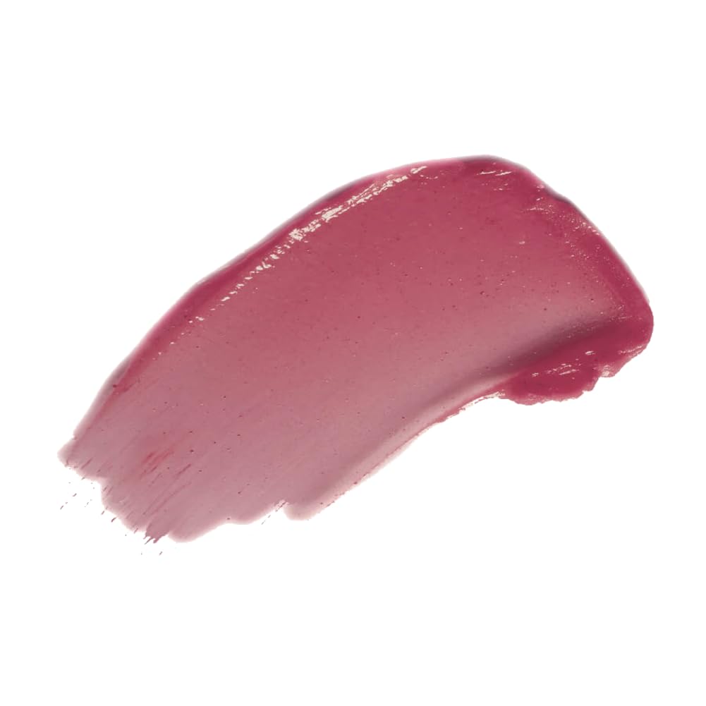FLOWER Beauty Multistick applied to cheek for dewy glow.