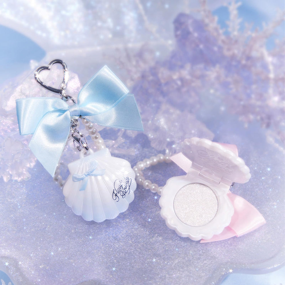 Blue Tears delivers icy sapphire shimmer for a luminous cheek glow.
