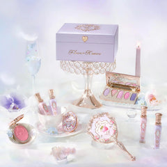 Flower Knows Glowy Lipgloss – shimmering pink shade adds radiant color.