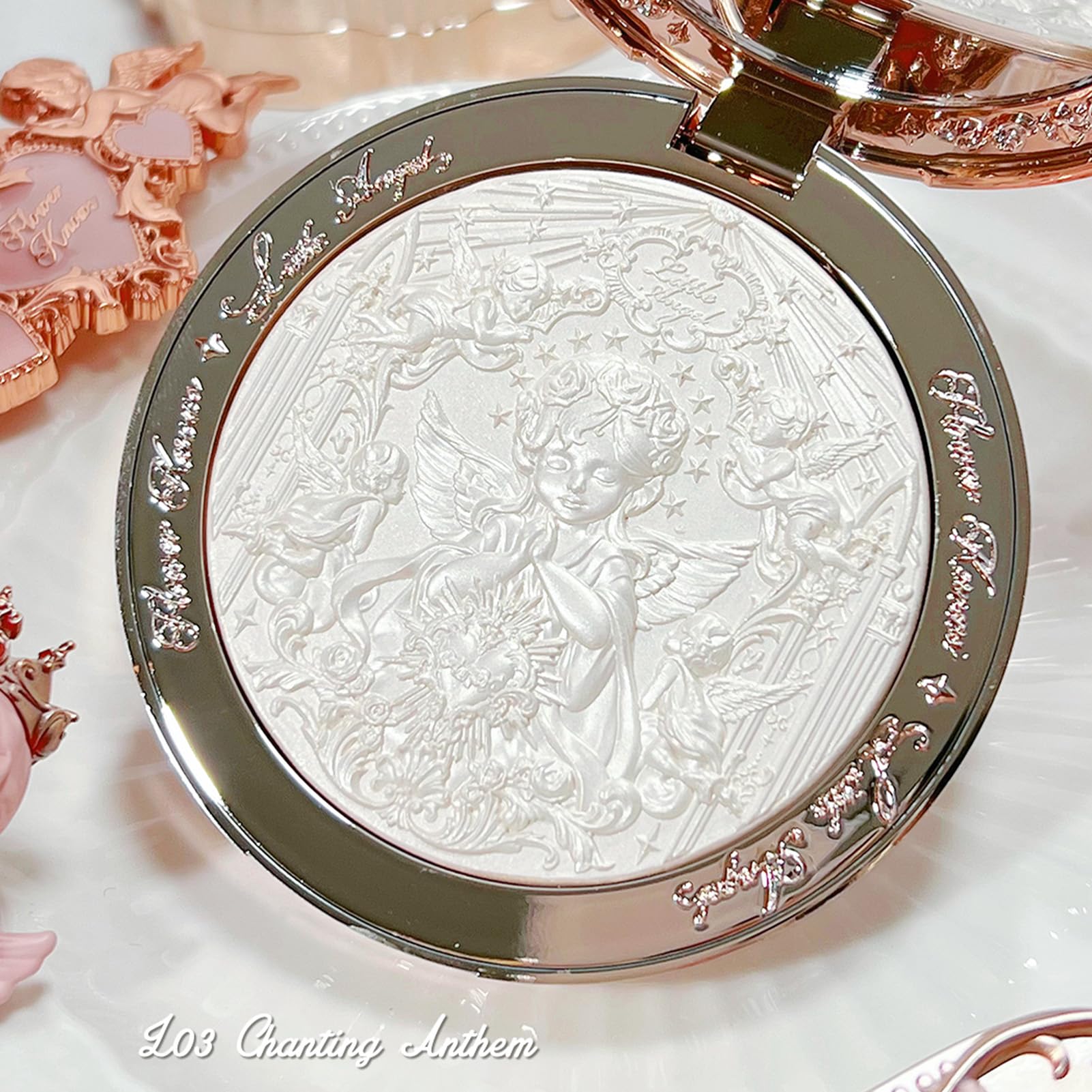 Embellished packaging evokes rose-window light and divine glow
