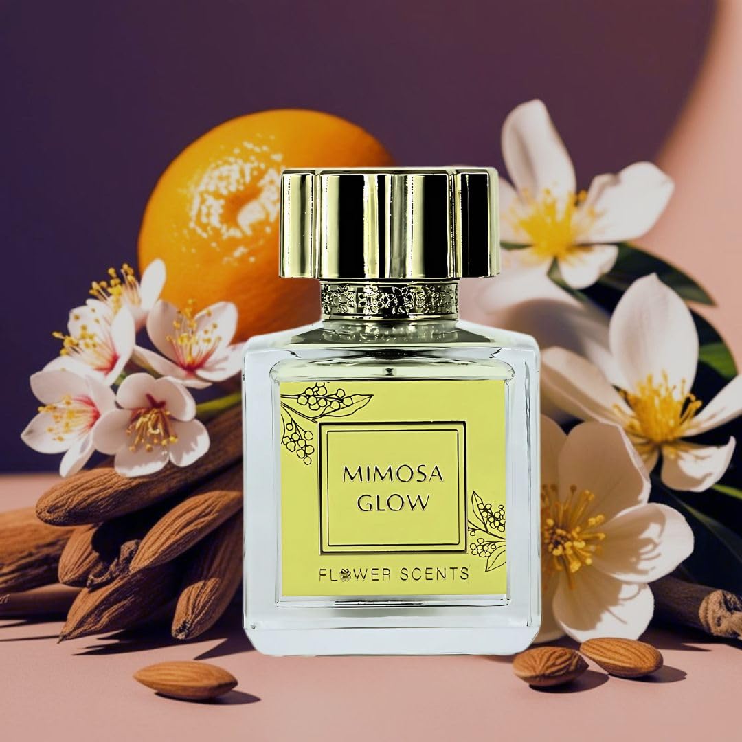 Flower Scents Mimosa Glow reflection in glass suggests lasting brilliance.