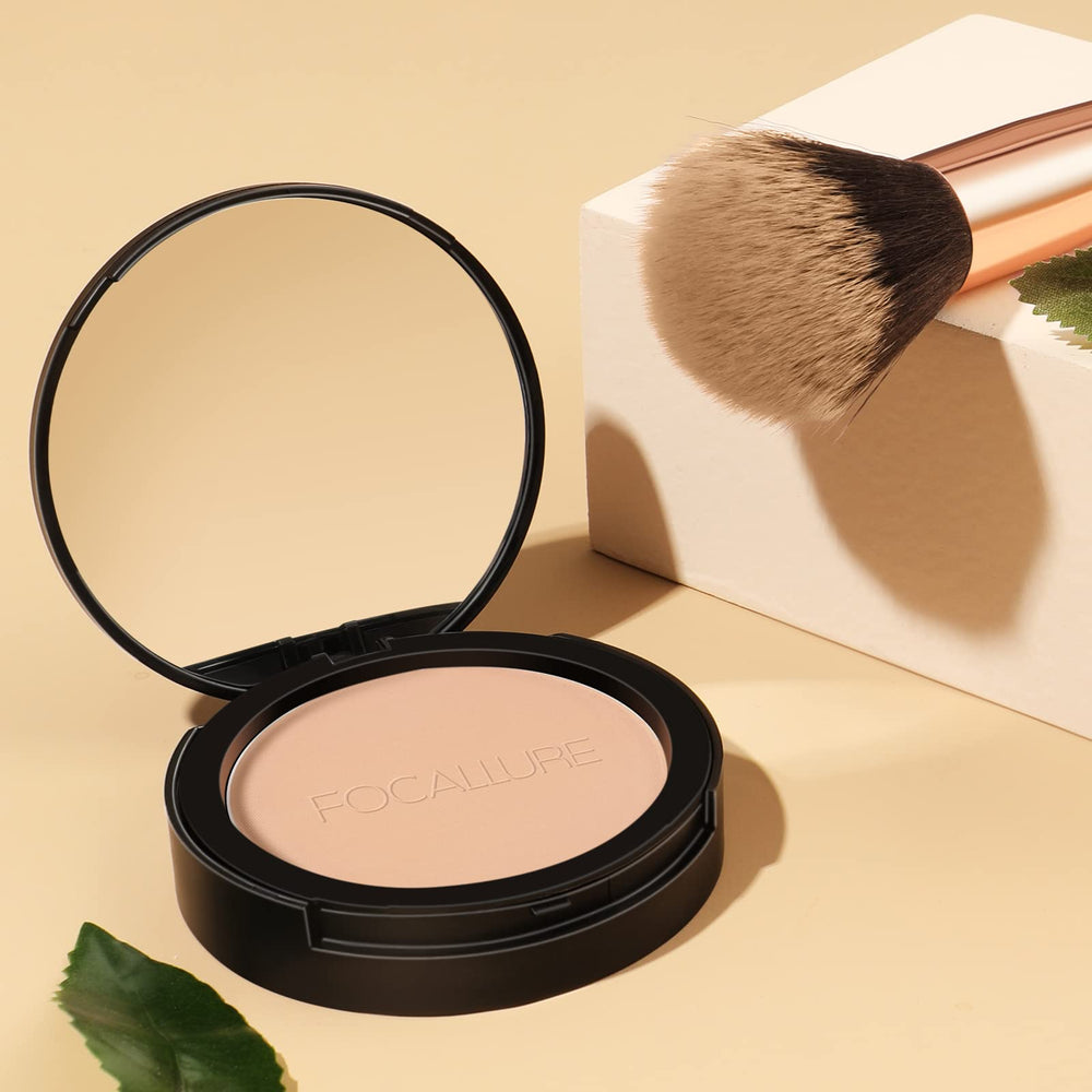 Portable FOCALLURE Flawless pressed powder compact in close-up