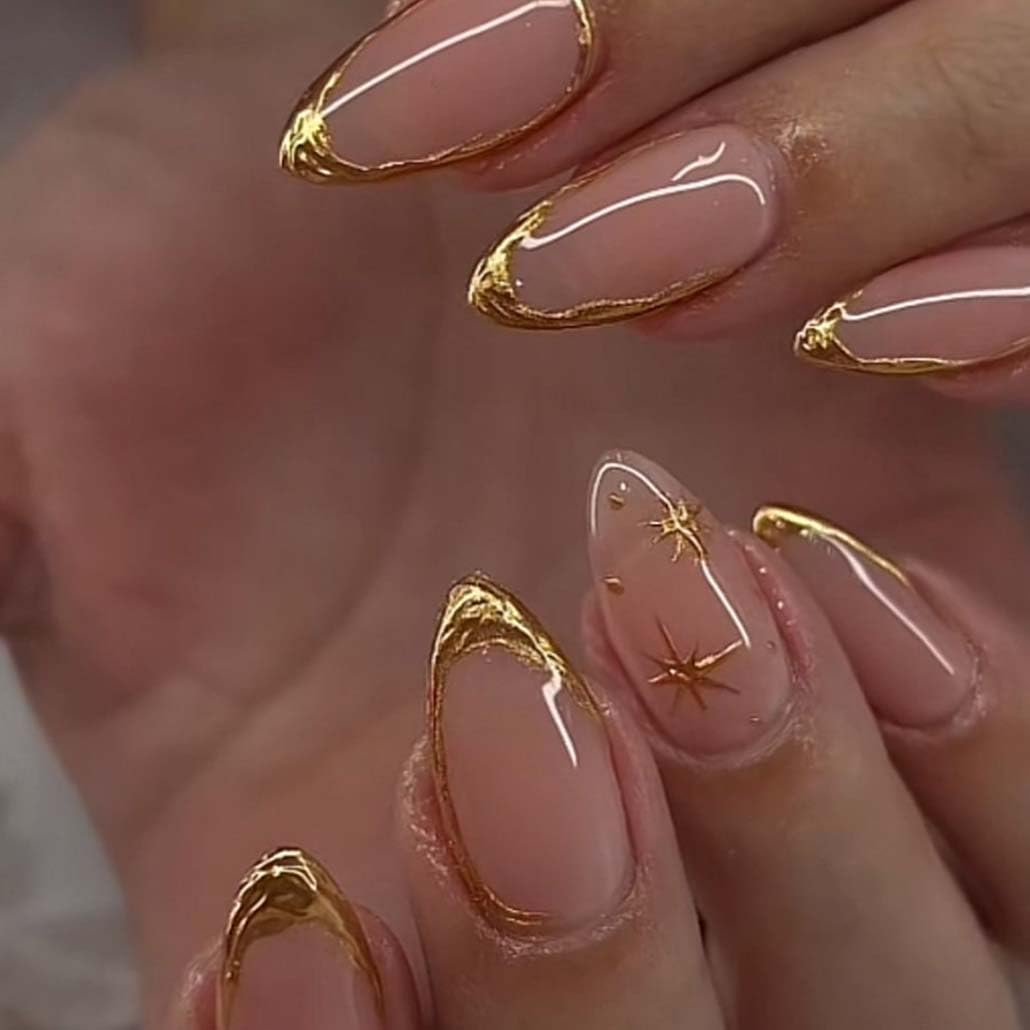 Foccna almond press-on nails with gold line design for quick, chic manicures.