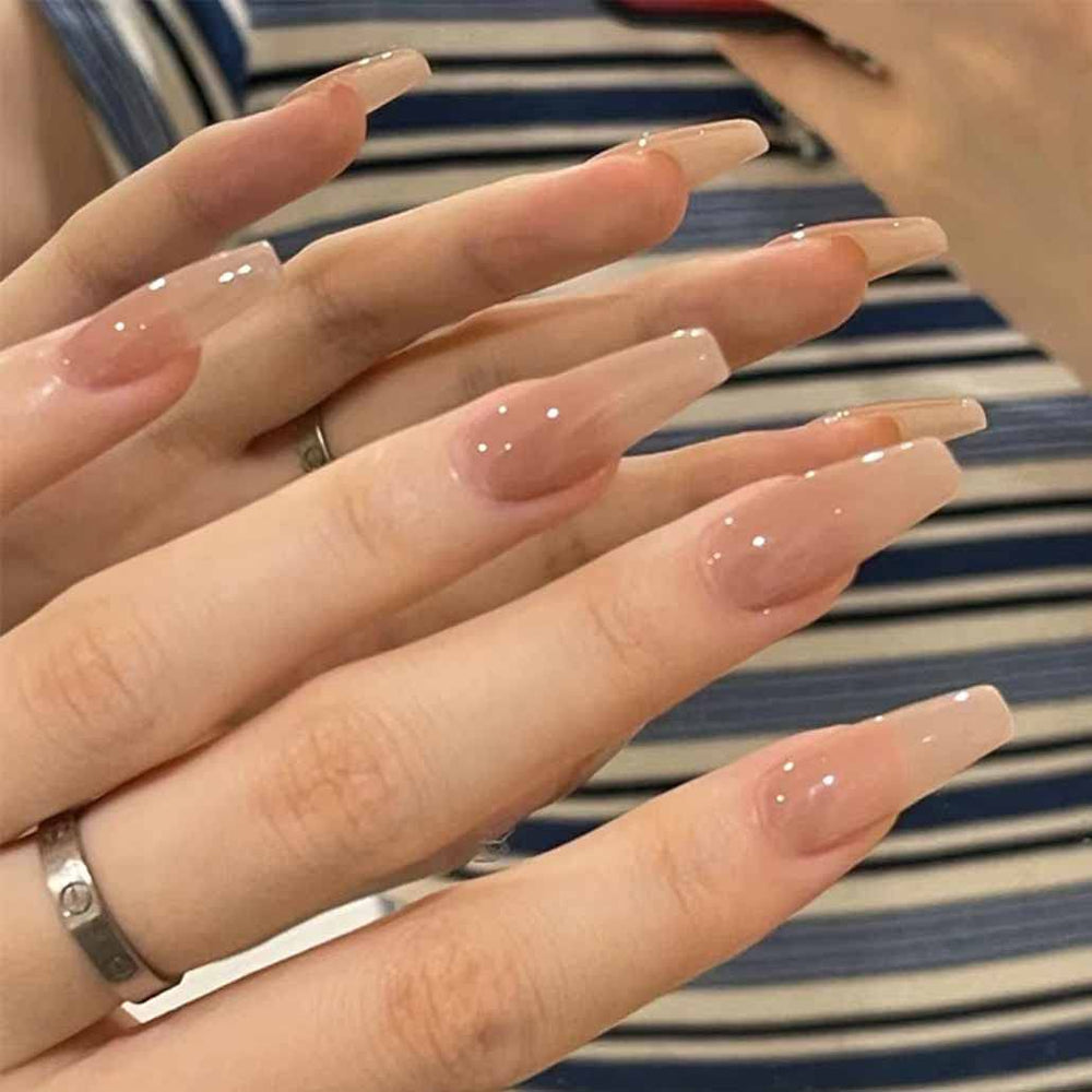 Foccna coffin press-on nails nude long for chic at-home manicure.