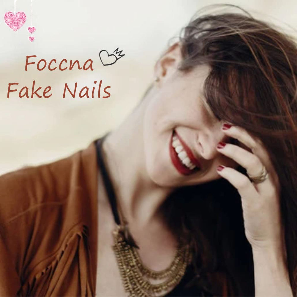Close-up of Foccna nails with glossy finish ready to wear.