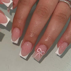 Foccna pink glossy full-cover nails in white square shape for a chic manicure