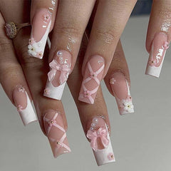 Foccna press-on nails with rhinestones for a glossy pink glam look