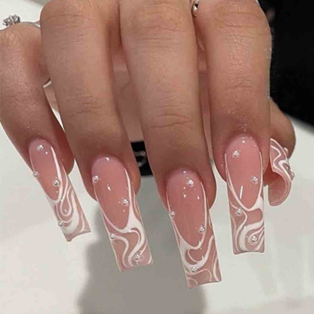Foccna square press-on nails in pearl pink, closeup for quick at-home manicures.