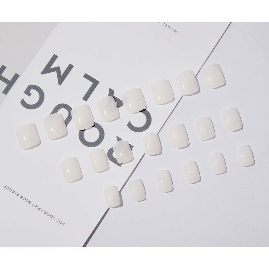 Foccna white nails on hand demonstrating easy 5-minute application.